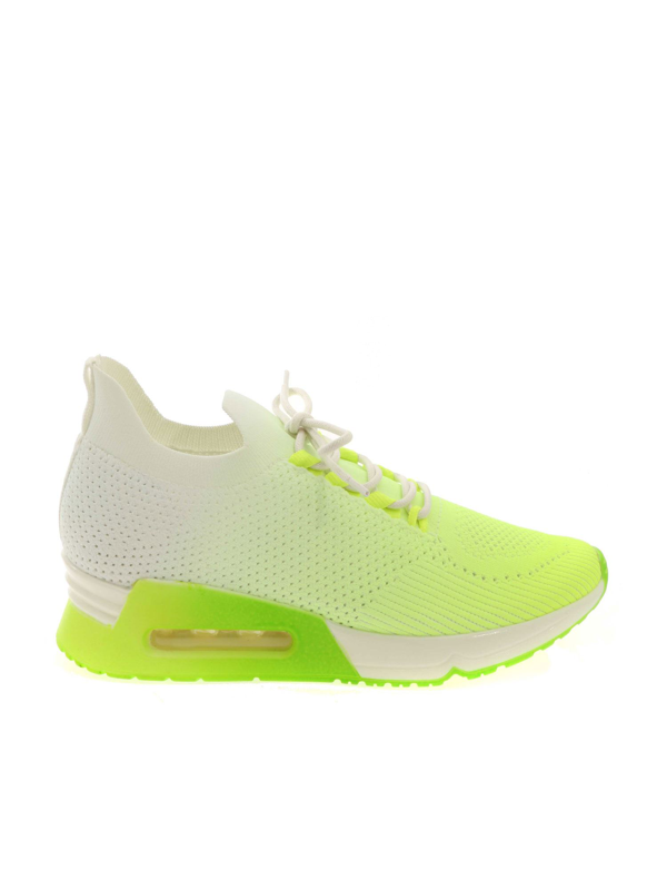 neon green and white sneakers