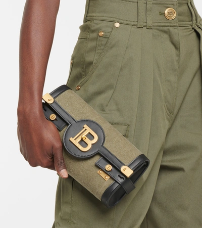 Shop Balmain B-buzz 23 Canvas Crossbody Bag In Green