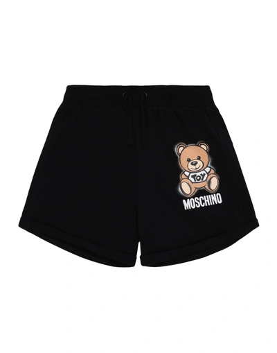 Shop Moschino Teen Shorts & Bermuda Shorts In Black