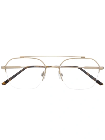 Shop Calvin Klein Pilot-frame Glasses In Gold