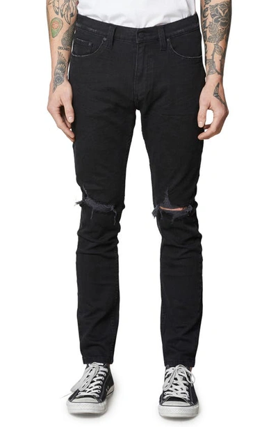 Shop Rolla's Stinger Skinny Fit Jeans In Black Rip