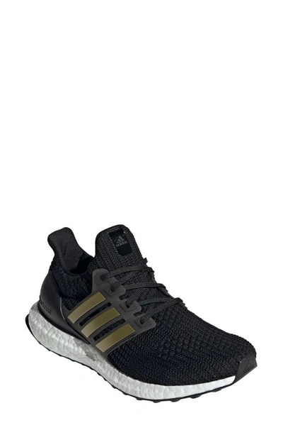 Shop Adidas Originals Ultraboost Dna Running Shoe In Core Black/ Gold / White