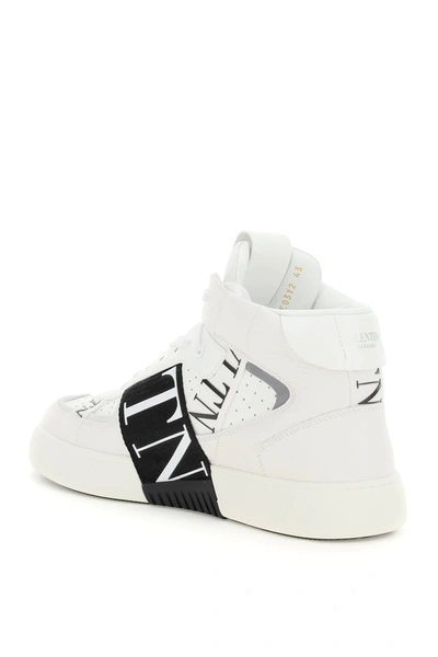 Shop Valentino Vl7n Mid-top Sneakers In White,black