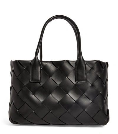 Shop Bottega Veneta Leather Maxi Cabat Tote Bag