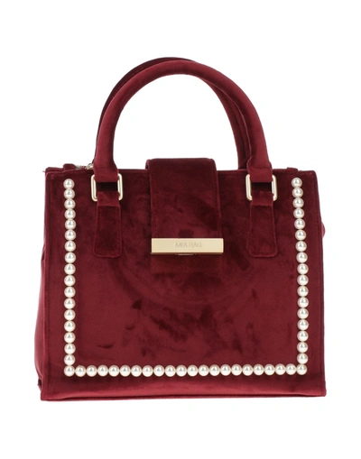 Shop Mia Bag Handbags In Maroon