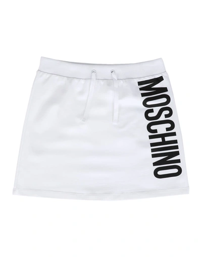 Shop Moschino Teen Skirts In White