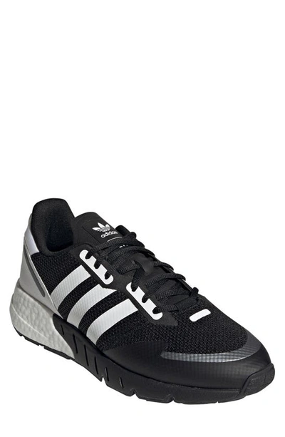 Shop Adidas Originals Zx 1k Boost Sneaker In Core Black/ Silver
