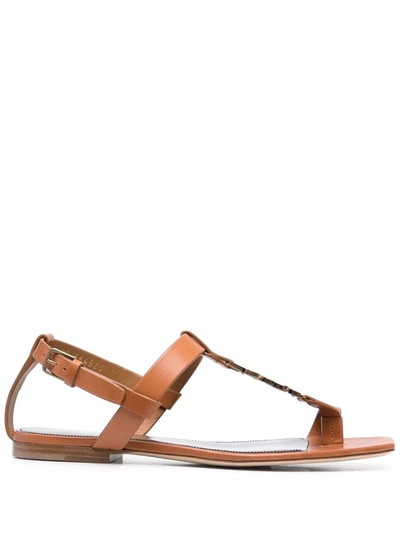 Shop Saint Laurent Cassandra Logo-strap Flat Sandals In Braun