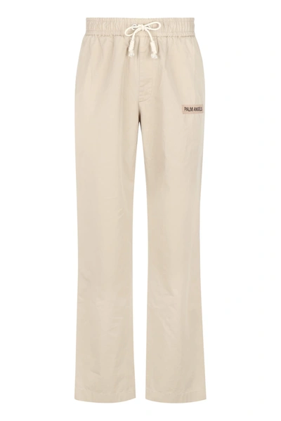 Shop Palm Angels Contrasting Side Stripes Trousers In Beige