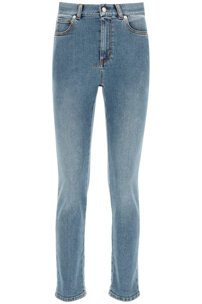 Shop Alexander Mcqueen Slim Washed Denim Jeans In Indigo Washed (blue)