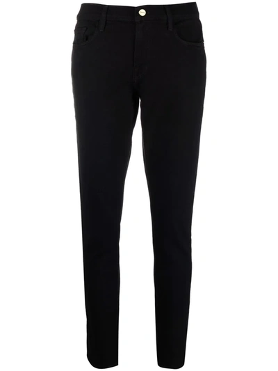 Shop Frame Le Garcon Mid-rise Skinny Jeans In Schwarz