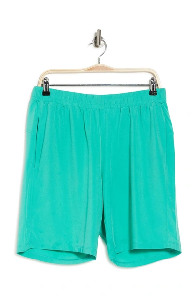 Shop Z By Zella Traverse Woven Shorts In Green Marine