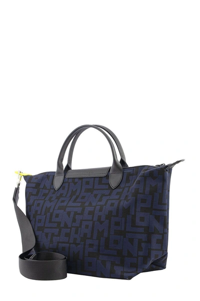 Shop Longchamp Le Pliage Lgp - Top Handle Bag M In Black/blue Marine