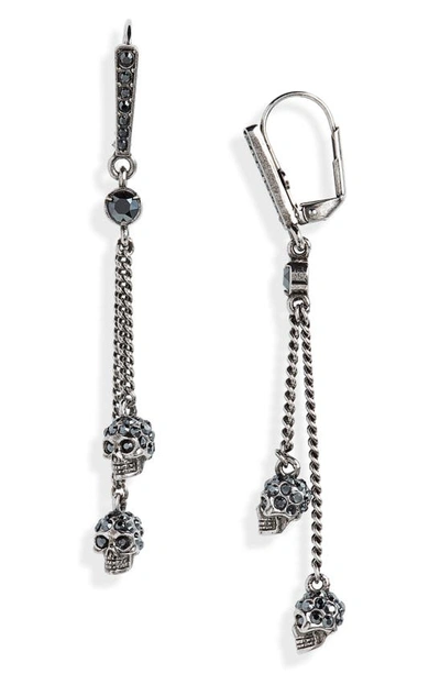 Shop Alexander Mcqueen Double Skull Drop Earrings In Silver