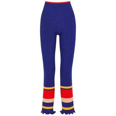 Shop Paco Rabanne Blue Striped Ribbed-knit Trousers In Navy