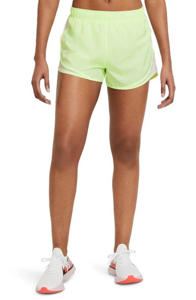 Shop Nike Dri-fit Tempo Running Shorts In Barely Volt/ Light Violet
