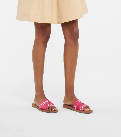 Shop Chloé Woody Canvas Slides In Pink