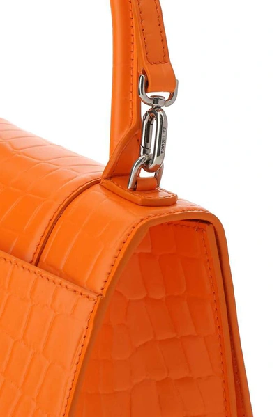 Shop Balenciaga Hourglass Small Top Handle Bag In Orange