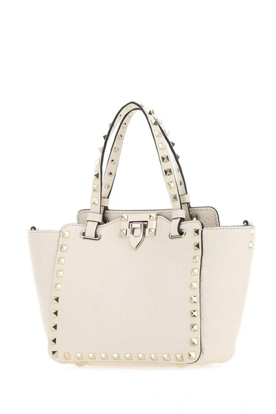Shop Valentino Garavani Rockstud Mini Tote Bag In White