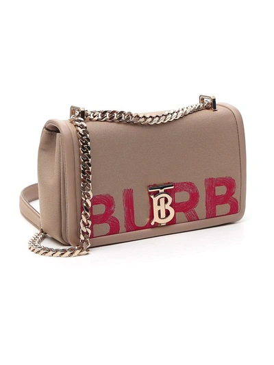 Shop Burberry Lola Graffiti Logo Shoulder Bag In Beige