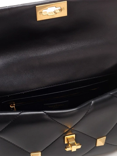 Shop Valentino Garavani Roman Stud Large Shoulder Bag In Black