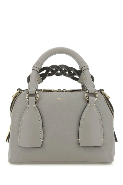 Shop Chloé Daria Small Top Handle Bag In Grey