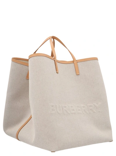 Shop Burberry Embossed Logo Extra Large Beach Tote Bag In Beige