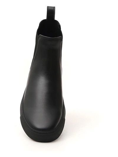 Shop Valentino Vltn Beatle Ankle Boots In Black