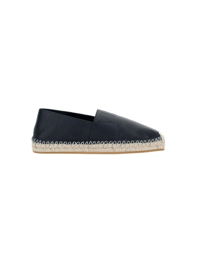 Shop Valentino Vltn Debossed Espadrilles In Black