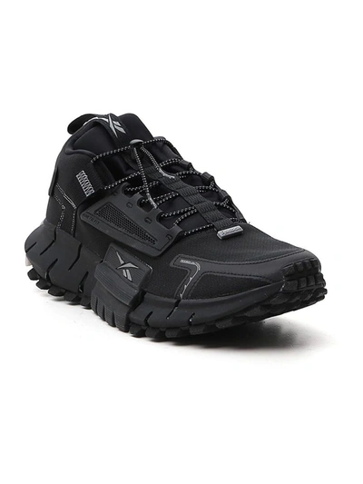 Shop Reebok Zig Kinetica Edge Sneakers In Black