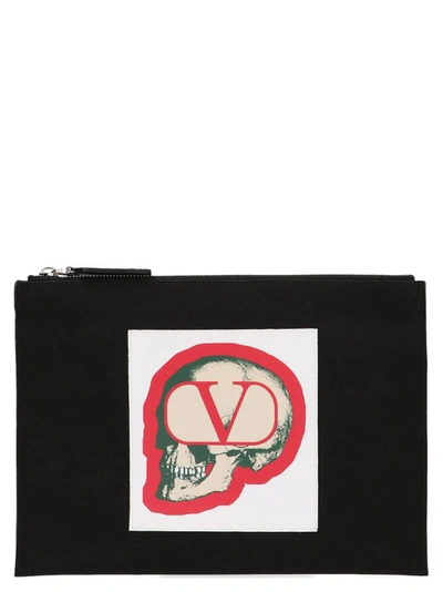 Shop Valentino X Undercover Skull Print Pouch In Black