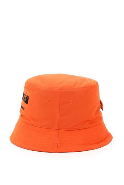 Shop Alexander Mcqueen Graffiti Logo Print Bucket Hat In Orange