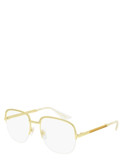 Shop Gucci Eyewear Oval Frame Sunglasses In Gold