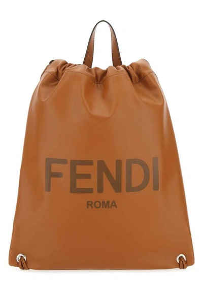 Shop Fendi Logo Embossed Top Handle Backpack In Brown