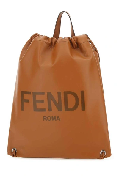 Shop Fendi Logo Embossed Top Handle Backpack In Brown