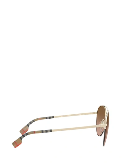 Shop Burberry Eyewear Aviator Frame Sunglasses In Gold