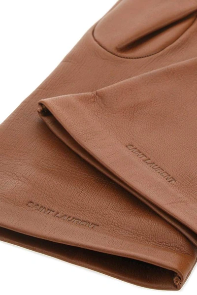 Shop Saint Laurent Embossed Logo Gloves In Brown