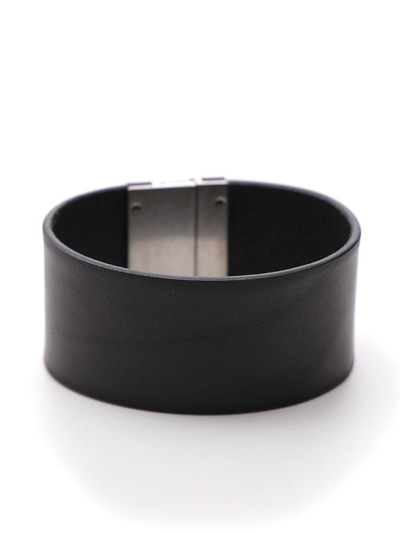 Shop Saint Laurent Logo Cuff Bracelet In Black