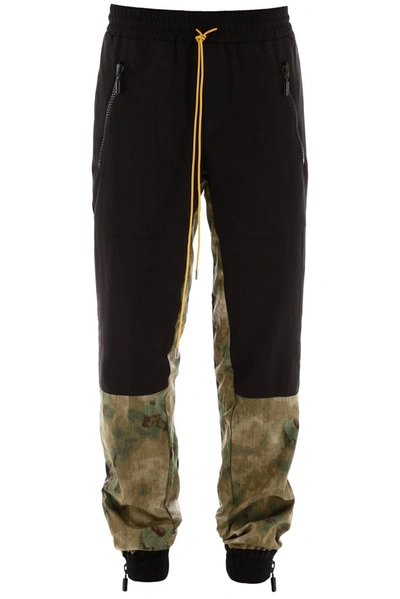 Shop Rhude Camouflague Paneled Track Pants In Multi