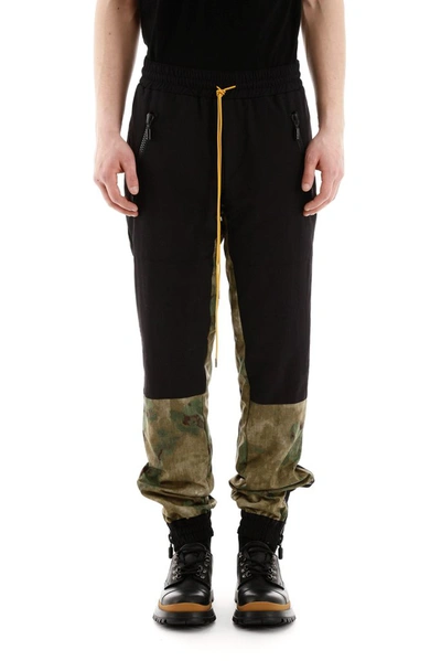 Shop Rhude Camouflague Paneled Track Pants In Multi