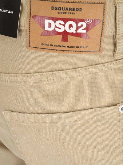 Shop Dsquared2 Rear Logo Patch Jeans In Beige