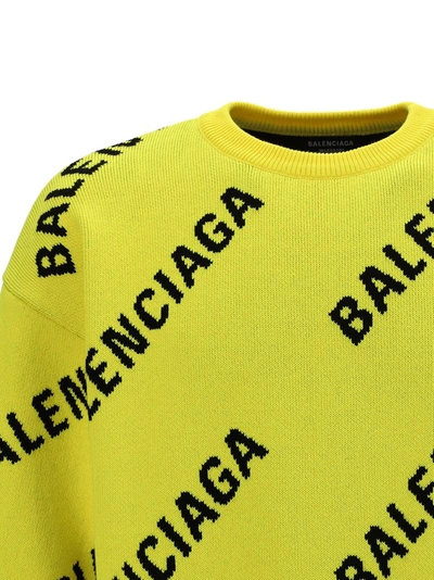 Shop Balenciaga Allover Logo Intarsia Sweater In Yellow