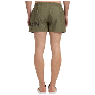 Shop Balmain Logo Print Swim Shorts In Green