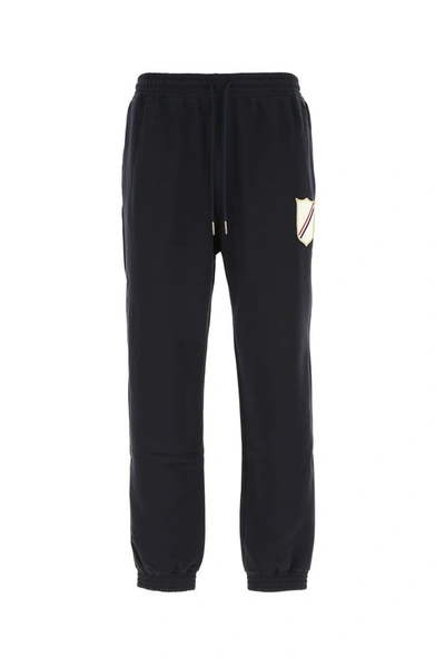 Shop Thom Browne Logo Patch Track Pants In Navy