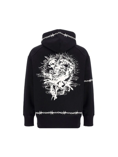 Shop Givenchy Gothic Oversized Hoodie In Black