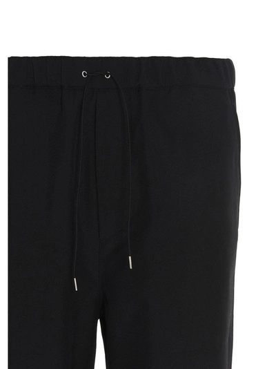 Shop Oamc Drawstring Cropped Pants In Black