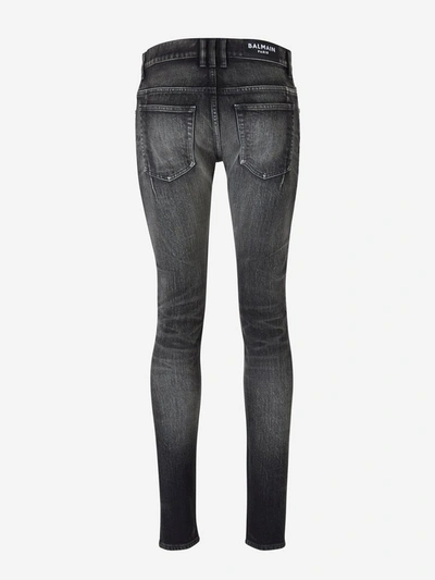 Shop Balmain Distressed Skinny Jeans In Black