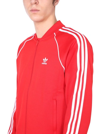 Shop Adidas Originals Adicolor Classics Primeblue Sst Track Jacket In Red