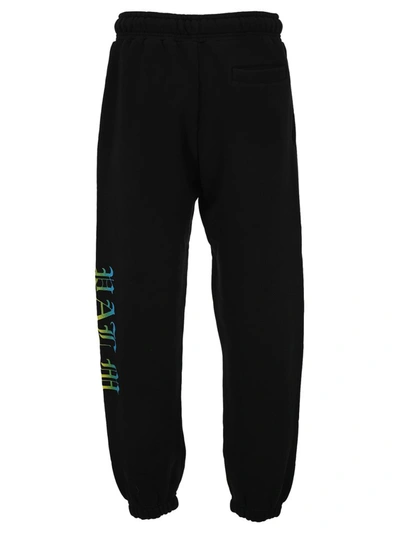 Shop Palm Angels Gothic Logo Track Pants In Black
