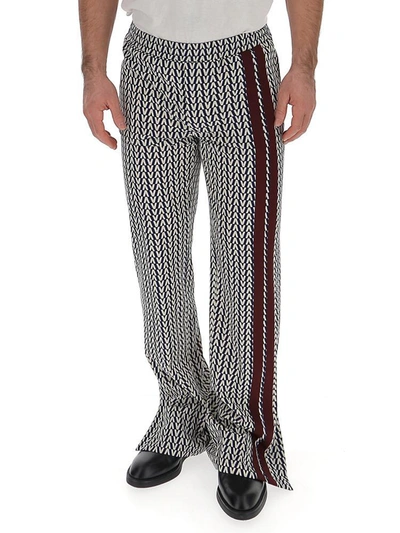 Shop Valentino V Printed Trousers In Multi